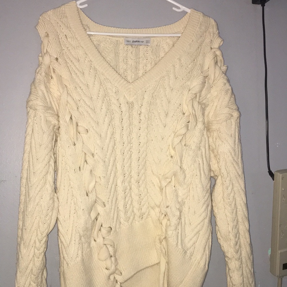 off-white knitted sweater, fits as a large